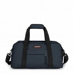 Torba podróżna Eastpak Compact Plus. Niebieskie torebki klasyczne damskie Eastpak, bez wzorów, bez dodatków. Za 281.00 zł.