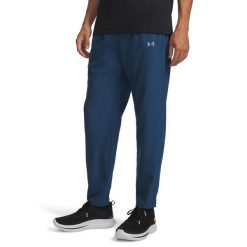 Spodnie treningowe Under Armour Velociti Pro Storm 6005898. Białe spodnie sportowe męskie Under Armour, z elastanu. Za 457.15 zł.