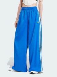 Adidas Spodnie dresowe w kolorze niebieskim rozmiar: 44. Niebieskie spodnie dresowe damskie Adidas, bez wzorów, z dresówki. Za 140.86 zł.