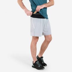 Spodenki do biegania w terenie męskie Kiprun Run 900 Ultra. Szare szorty męskie KIPRUN, ze skóry, bez kołnierzyka. W wyprzedaży za 69.99 zł.