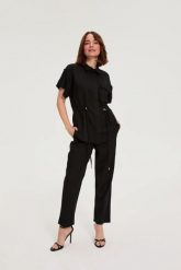 Spodnie z wiskozy i lnu czarne. Czarne spodnie materiałowe damskie MOODO, bez wzorów, z bawełny. Za 139.99 zł.