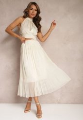 Jasnobeżowa Rozkloszowana Spódnica z Tiulu Wykończona Gumką w Pasie Risshara. Brązowe spódniczki damskie Renee, l, bez wzorów, z tiulu, eleganckie, midi, dopasowane. Za 44.99 zł.
