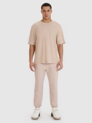 4F T-shirt oversize z modalem męski - beżowy S. Brązowe t-shirty męskie 4f, m, bez wzorów, z bawełny, bez kołnierzyka. W wyprzedaży za 59.99 zł.