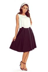 Czarna Casualowa Rozkloszowana Midi Spódnica z Kieszeniami. Czarne spódniczki damskie Numoco, xl, bez wzorów, z elastanu, midi, rozkloszowane. Za 138.90 zł.