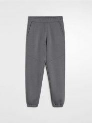 Spodnie dresowe regular fit - szary. Szare spodnie sportowe męskie Sinsay, z dresówki. Za 49.99 zł.