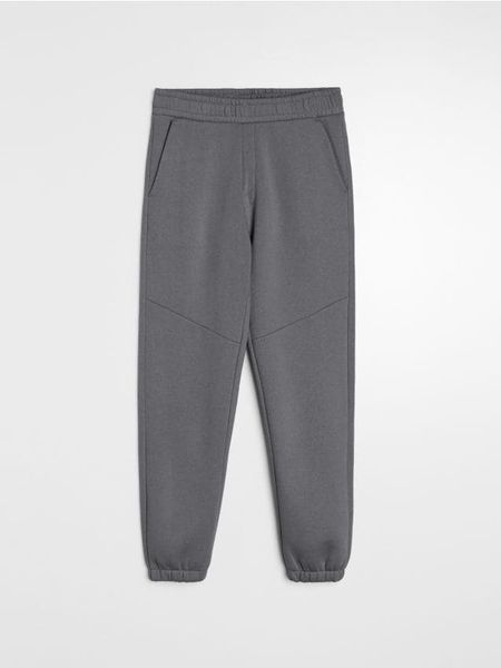 Spodnie dresowe regular fit - szary. Szare spodnie sportowe męskie Sinsay, z dresówki. Za 49.99 zł.