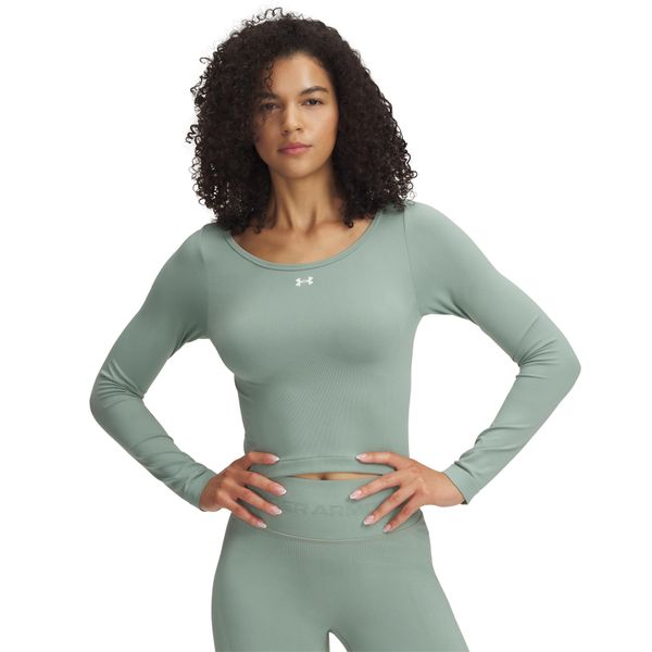 Damski top treningowy z długim rękawem Under Armour Train Seamless. Zielone topy sportowe damskie Under Armour, l, bez wzorów, z dzianiny, bez ramiączek. Za 252.30 zł.