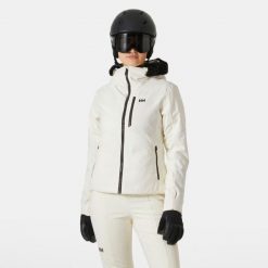 Damska kurtka narciarska Helly Hansen Valdisere 2.0. Białe kurtki damskie Helly Hansen, na zimę, bez wzorów, bez kaptura. W wyprzedaży za 1,243.50 zł.