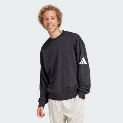 Bluza Essentials Loose Fit 3 Bar Logo. Czarne bluzy bez kaptura męskie Adidas, l, z materiału. W wyprzedaży za 124.50 zł.