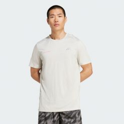 Koszulka Own The Run Melange. Szare bluzki sportowe damskie Adidas, m, bez wzorów, bez kołnierzyka. Za 199.00 zł.