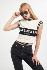 Top wełniany damski BALMAIN. Topy damskie Balmain, bez wzorów, z wełny, bez kołnierzyka. W wyprzedaży za 3,381.75 zł.