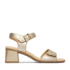 Sandały Remonte. Żółte sandały damskie Remonte, bez wzorów, bez obcasa, na słupku. Za 379.99 zł.