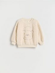 Bluza z haftem - złamana biel. Bluzy i bluzki niemowlęce Reserved, bez wzorów, bez ramiączek, bez kaptura. W wyprzedaży za 22.99 zł.