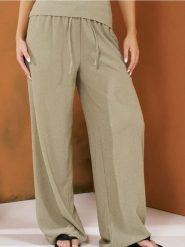 Luźne spodnie wide leg - wielobarwny. Spodnie materiałowe damskie Sinsay, bez wzorów. W wyprzedaży za 29.99 zł.