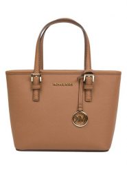 Michael Kors Skórzana torebka w kolorze karmelowym - 27,5 x 19 x 10 cm rozmiar: onesize. Brązowe torebki klasyczne damskie Michael Kors, bez wzorów, z materiału, bez dodatków. Za 856.56 zł.