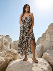 Sukienka midi na ramiączkach z rozcięciem z wiskozą - wielobarwny. Sukienki damskie Sinsay, l, bez wzorów, z wiskozy, bez kołnierzyka, bez ramiączek, midi. Za 49.99 zł.