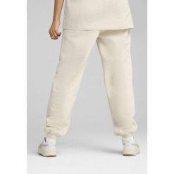 Spodnie dresowe unisex Essentials Elevated PUMA Alpine Snow White. Białe spodnie dresowe damskie Puma, s, bez wzorów, z dresówki. W wyprzedaży za 179.00 zł.