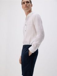 Szorty chino slim - granatowy. Niebieskie szorty męskie Reserved, z bawełny, bez kołnierzyka. Za 109.99 zł.