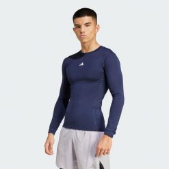 Koszulka TECHFIT Compression Training Long Sleeve. Niebieskie t-shirty sportowe męskie Adidas, z materiału, bez ramiączek, na fitness i siłownię, techfit (adidas). Za 179.00 zł.