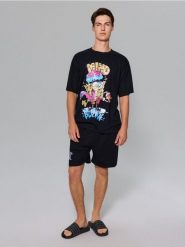 Bawełniana piżama dwuczęściowa SpongeBob - czarny. Czarne piżamy męskie Sinsay, l, bez wzorów, z bawełny, bez ramiączek. Za 45.99 zł.