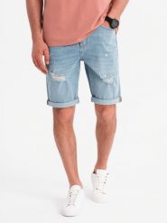 Męskie krótkie spodenki jeansowe z przetarciami i podwiniętą nogawką – jasnoniebieskie V1 OM-SRDS-0186 - XXL. Niebieskie szorty męskie Ombre Clothing, z bawełny, bez kołnierzyka. W wyprzedaży za 109.99 zł.
