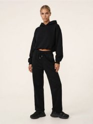 Spodnie wide leg comfort z dzianiny fleece Active - czarny. Czarne spodnie sportowe damskie Sinsay, l, z dzianiny, na fitness i siłownię. Za 49.99 zł.