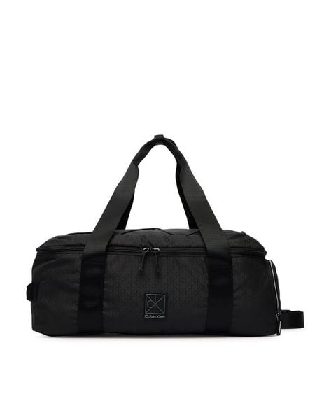 Calvin Klein Torba podróżna Utility Emblem Aop LV04D3385G Czarny. Czarne torebki klasyczne damskie CALVIN KLEIN, bez wzorów, z materiału, bez dodatków. Za 699.99 zł.