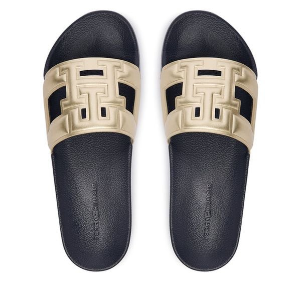Klapki Tommy Hilfiger. Żółte klapki damskie Tommy Hilfiger, bez wzorów, bez obcasa. Za 189.99 zł.