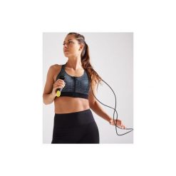 Stanik fitness kardio ZIP 900. Białe biustonosze sportowe damskie DOMYOS, bez wzorów, z elastanu. Za 79.99 zł.