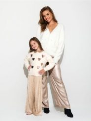 Spodnie wide leg z połyskiem - złoty. Żółte spodnie materiałowe damskie Sinsay, bez wzorów. Za 59.99 zł.