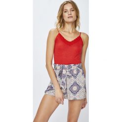 Jacqueline de Yong - Top Della. Niebieskie topy damskie Jacqueline de Yong, l, bez wzorów, z dzianiny, bez kołnierzyka. W wyprzedaży za 27.90 zł.