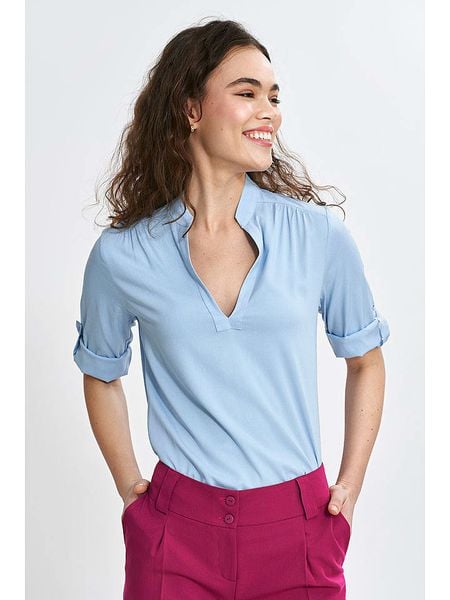 Nife Bluzka w kolorze błękitnym rozmiar: 36. Niebieskie bluzki damskie Nife, bez wzorów, z wiskozy, bez kołnierzyka, bez ramiączek. Za 104.64 zł.