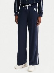 MICHAEL Michael Kors Spodnie dresowe MR630Y0K8N Granatowy Regular Fit. Niebieskie spodnie dresowe damskie MICHAEL Michael Kors, xs, bez wzorów, z dresówki. Za 769.99 zł.