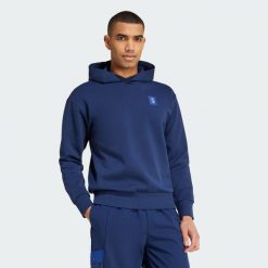 Bluza z kapturem Manchester United Seasonal Doubleknit. Niebieskie bluzy z kapturem męskie Adidas, s, z dzianiny. Za 349.00 zł.
