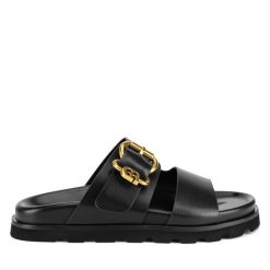 Klapki GINO ROSSI. Czarne klapki damskie Gino Rossi, bez wzorów, bez obcasa. Za 329.99 zł.