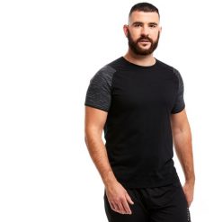 Koszulka piłkarska dla dorosłych Kipsta T100 drużynowa. Czarne t-shirty sportowe męskie KIPSTA, xs, z bawełny, bez ramiączek, na fitness i siłownię. W wyprzedaży za 29.99 zł.