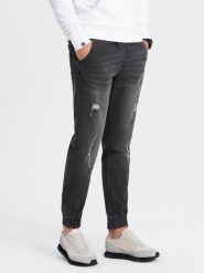 Męskie spodnie jeansowe JOGGERY z przetarciami - czarne V2 OM-PADJ-0150 - XL. Czarne spodnie materiałowe męskie Ombre Clothing, bez wzorów, z bawełny. W wyprzedaży za 69.99 zł.