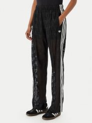 Adidas Spodnie dzianinowe Crochet Firebird KD0346 Czarny Regular Fit. Czarne spodnie materiałowe damskie Adidas, bez wzorów, z dzianiny. Za 359.99 zł.