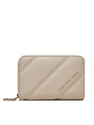 Calvin Klein Jeans Portfel Quileted Med Zip K60K612256 Écru. Białe portfele damskie Calvin Klein Jeans, bez wzorów, z jeansu. Za 259.99 zł.