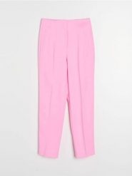 Spodnie cygaretki z domieszką wiskozy - różowy. Czerwone spodnie materiałowe damskie Sinsay, bez wzorów, z wiskozy. Za 49.99 zł.