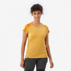 Koszulka damska trekkingowa z krótkim rękawem Merino Resist. Brązowe bluzki damskie FORCLAZ, m, bez wzorów, z elastanu, sportowe, bez kołnierzyka, bez ramiączek. Za 149.99 zł.