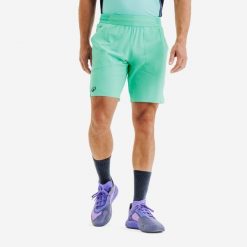 Spodenki tenisowe męskie Kuikma Dry+ Gaël Monfils. Zielone szorty męskie KUIKMA, bez wzorów, z materiału, sportowe. Za 119.99 zł.