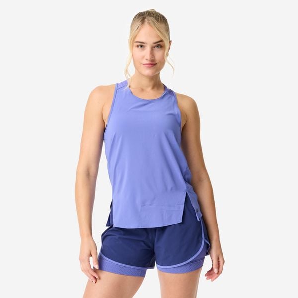 Koszulka fitness damska Domyos bez rękawów. Fioletowe bluzki sportowe damskie DOMYOS, l, bez wzorów, z materiału, bez ramiączek. Za 49.99 zł.