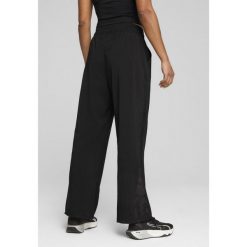 Damskie spodnie LACE PUMA Black. Czarne spodnie dresowe damskie Puma, m, na fitness i siłownię. W wyprzedaży za 219.00 zł.