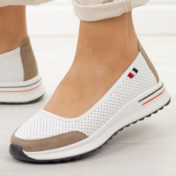 Białe gr ażurowane skórzane baleriny damskie Jezzi 7815. Białe baleriny damskie Jezzi, w ażurowe wzory, z dresówki, bez obcasa, na płaskiej podeszwie. Za 219.00 zł.