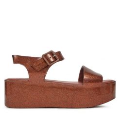 Sandały Melissa. Brązowe sandały damskie Melissa, bez wzorów, bez obcasa, na koturnie. Za 199.99 zł.