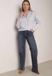 Niebieskie Jeansy z Wysokim Stanem i Szerokimi Nogawkami Henivia. Niebieskie jeansy damskie Born2be, z podwyższonym stanem. Za 129.99 zł.