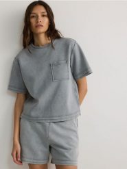 T-shirt oversize z melanżowej dzianiny - jasnoszary. Szare t-shirty damskie Reserved, l, bez wzorów, z bawełny, bez kołnierzyka. W wyprzedaży za 69.99 zł.