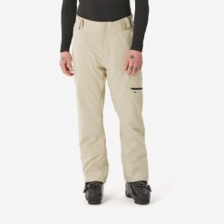 Spodnie narciarskie i snowboardowe męskie Quechua 500 softshell. Brązowe spodnie materiałowe męskie WED'ZE, bez wzorów, z materiału, sportowe. Za 299.99 zł.