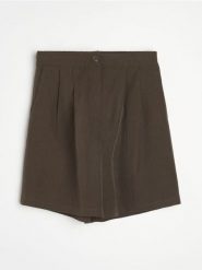 Szorty z lyocellem i domieszką lnu z zakładkami - brązowy. Brązowe szorty damskie Sinsay, bez wzorów, z lyocellu. Za 49.99 zł.